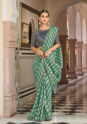 Striped overall saree paired with heavily embroidered blouse-22033