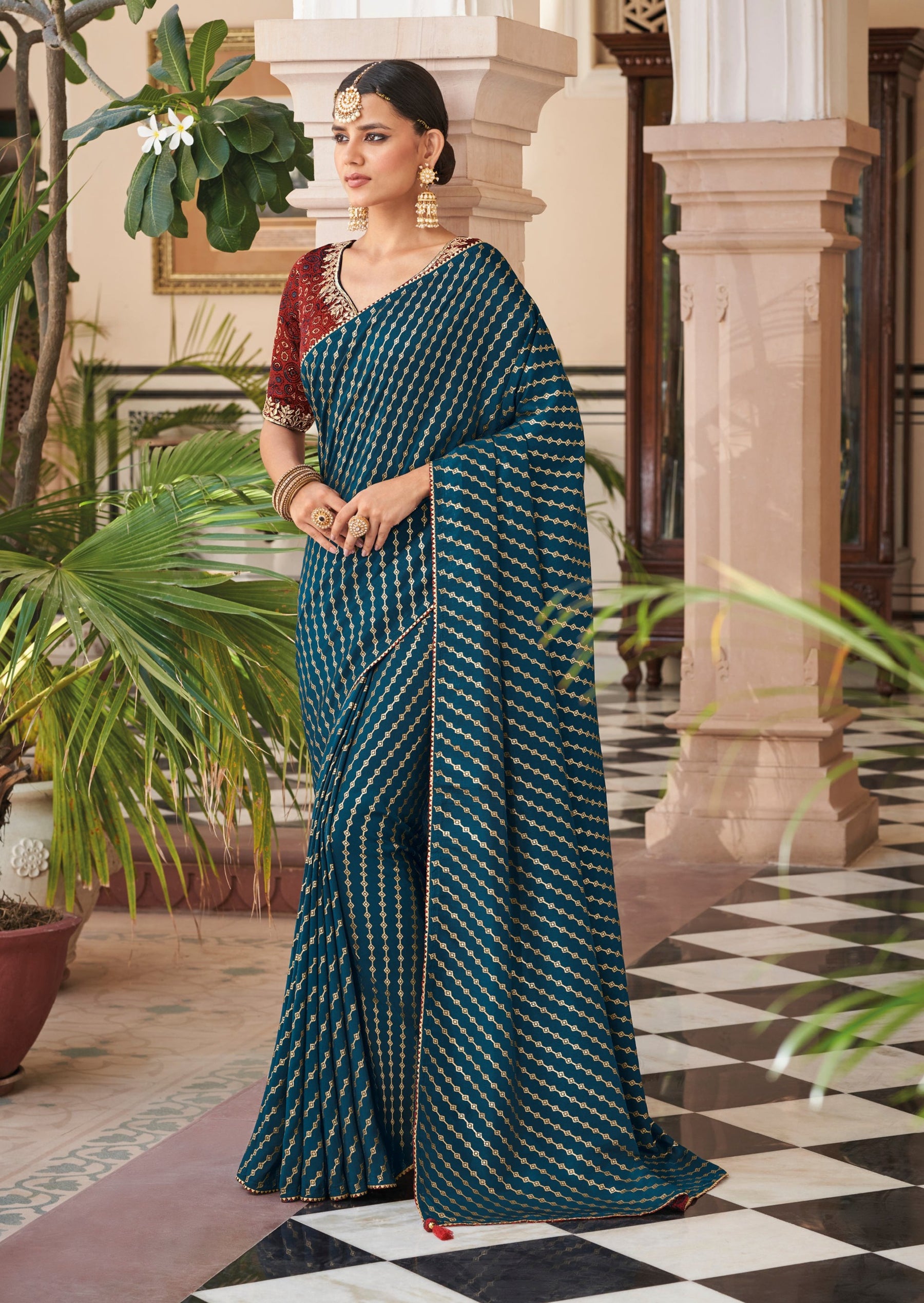 Striped overall saree paired with hand embroidered Ajrakh embroidered blouse-22035